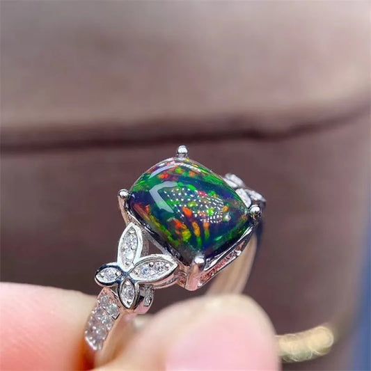 Jewelryhaven720™ ring with natural black noble opal measuring 6x8 mm. 925 sterling silver.